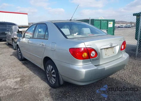 2003 Toyota Corolla Le z USA, uszkodzony, nr VIN JTDBR32E232014838